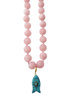 Necklace with pink beads and a turquoise fish pendant.