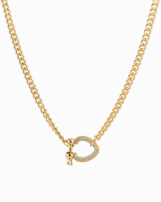 Gold necklace with a Horsebit Carabiner pendant.