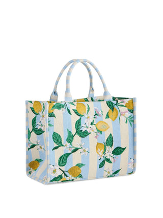 Tote bag with lemon and floral pattern.