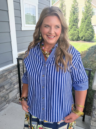 blue or green striped blouse