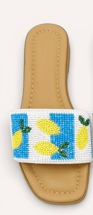 Beaded sandal with lemon design.