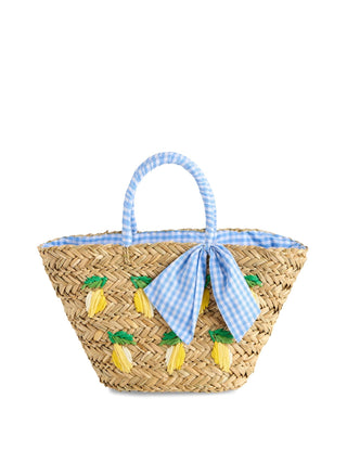 Woven bag with lemon decorations and a blue checkered ribbon.
