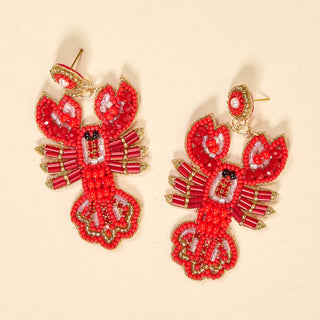 Red beaded lobster earrings.