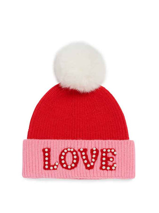 Pink and red beanie with love lettering on it with pearls.