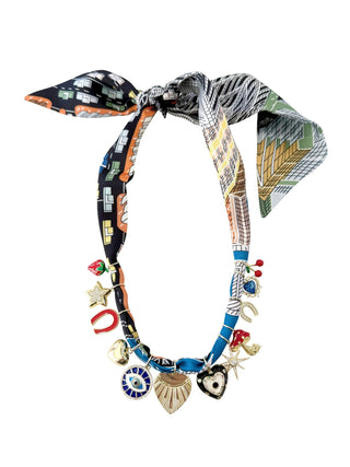 Scarf necklace with colorful charms.
