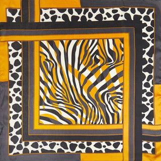 Patterned fabric bandana scarf with zebra and leopard prints.
