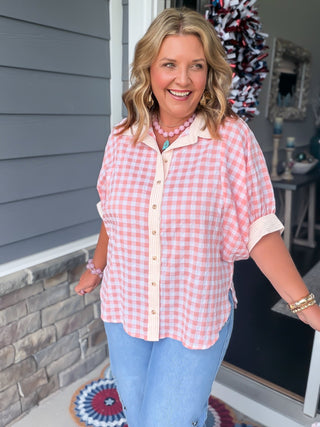 pink and white checkered blouse