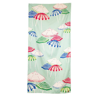 Beach towel with colorful umbrella pattern.