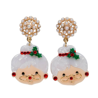 A pair of gold-tone and white faux-pearl Mrs Claus drop earrings with white hair, red nose, and green holly accents.