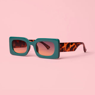 Green and tortoise framed sunglasses.