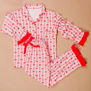 Pink pajama set with red bows 