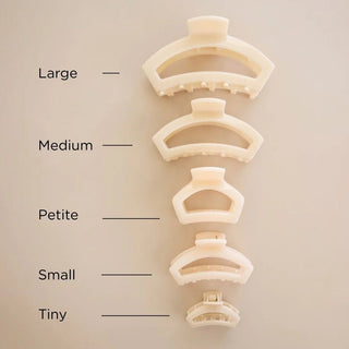 Almond beige open hair clips.