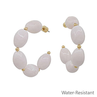 Light Pink oval acrylic earrings.