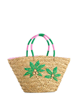 Woven straw beach bag with green palm leaf designs and pink accents.