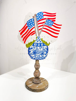 Decorative hydrangea topper with American flags.