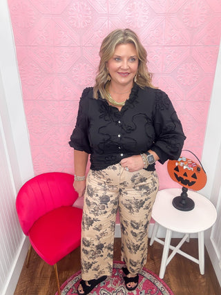 tan and black floral pants