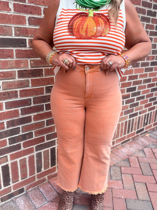  Orange Peyton, high-waisted with a vibrant acid-wash finish and cropped frayed hem 