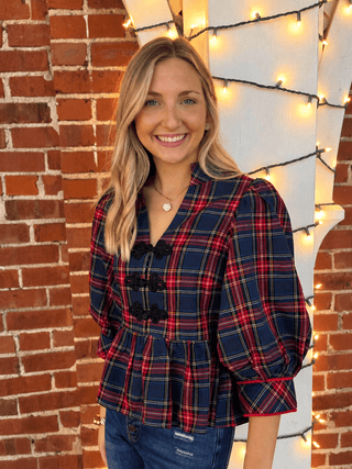 red plaid fit and flare blouse with 3/4 puffy sleeves