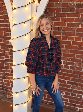 red plaid fit and flare blouse with 3/4 puffy sleeves