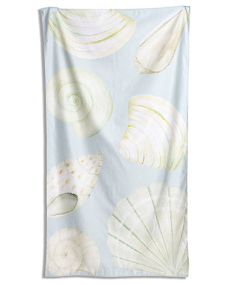 Beach towel with shell pattern.