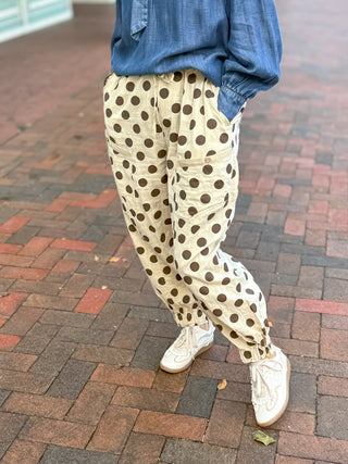 cotton polka dot pants, designed with a gathered ankle, drawstring waist, and handy pockets