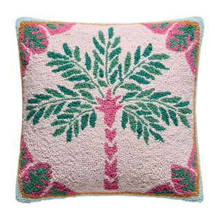 Decorative wool hook pillow with palm tree design.