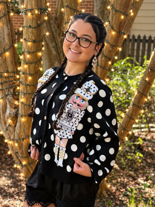 queen of sparkles button down cardigan with black and white polka dots and nutcrackers