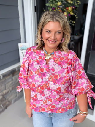 pink floral blouse