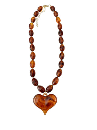 Brown beaded necklace with a heart-shaped pendant 