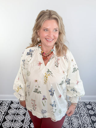 cream floral blouse