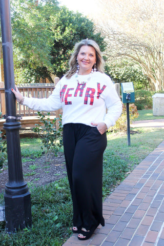 black ruffle hem pants