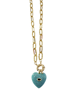 Gold necklace with a turquoise heart-shaped pendant.