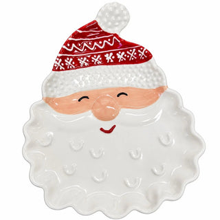 A ceramic Santa Claus head serving dish with a textured white beard, peach-colored face, red and white patterned hat, and a small red smile.