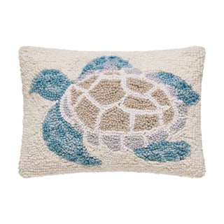 Decorative wool hook pillow with a turtle design.