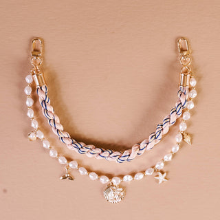 Seaside designed bag charm set.