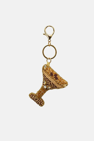 Gold beaded martini glass keychain.