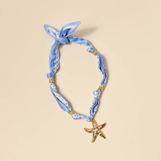 Reversible scarf necklace with starfish charm.