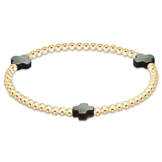 Enewtons Mother of Pearl signature cross bracelet.