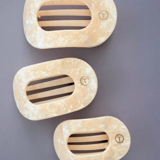 Soft Surf flat round hair clips by Teleties.