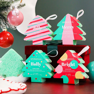 Tree-shaped Spongelle body wash infused buffers in a Christmas tree decoration style, 