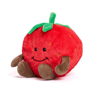 Plush strawberry warmie with a smiling face 