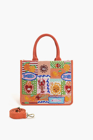 Colorful beaded handbag with sun & sea patterned design by America & Beyond.