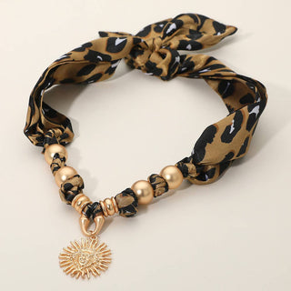 Leopard print scarf necklace with gold beads and sun charm 
