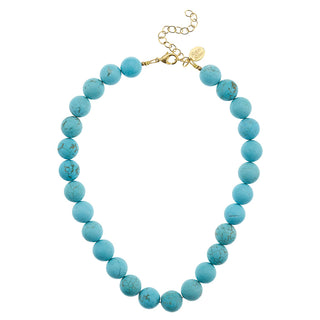Turquoise beaded necklace with a gold clasp by Susan Shaw.