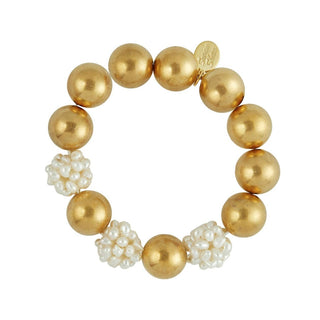 Gold and pearl cluster stretch bracelet by Susan Shaw.
