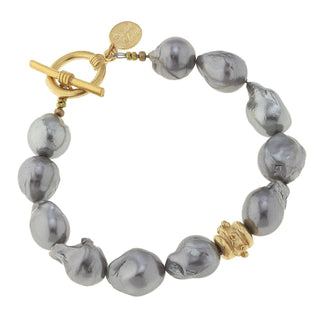 Bracelet with gray Baroque Pearl beads and gold clasp by Susan Shaw.