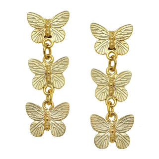 A pair of gold-tone drop earrings each featuring three textured butterfly charms connected by chain links in a cascading vertical arrangement.
