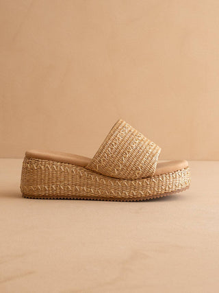 Woven raffia platform wedge sandal.