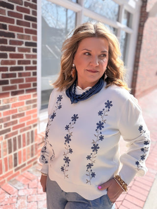white scalloped edge floral sweater