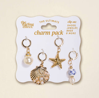 Charm pack with gold and pearl coastal charms.